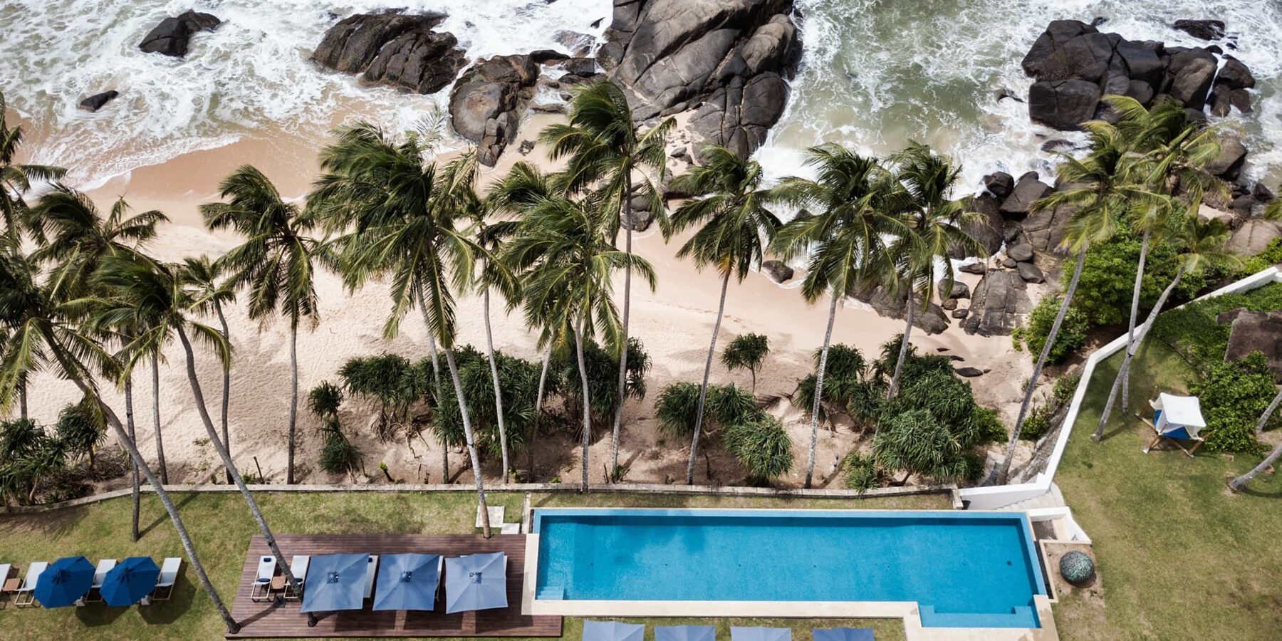 Sri Lanka Kumu Beach Aerial view of pool and palm trees at Kumu beach in Sri Lanka