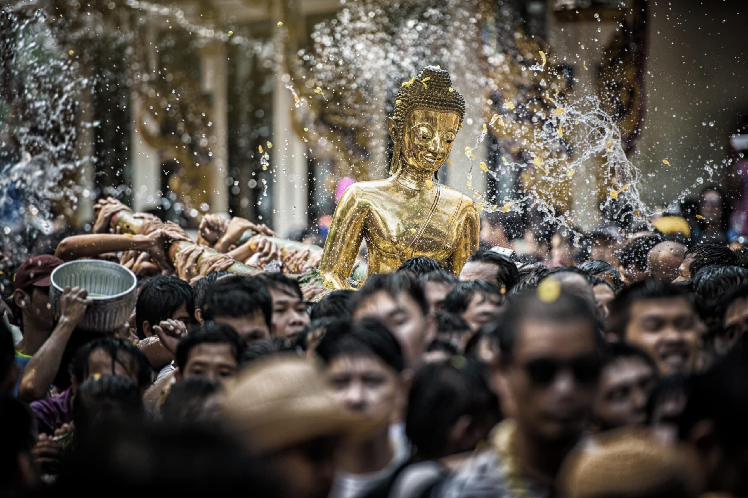 NONGKHAI THAILAND APRIL 13: Songkran Festival, The people pour water and joined parade of the statue of Luang Pho Phra Sai with respect to faith on April 13, 2014 in Nongkhai Thailand.
