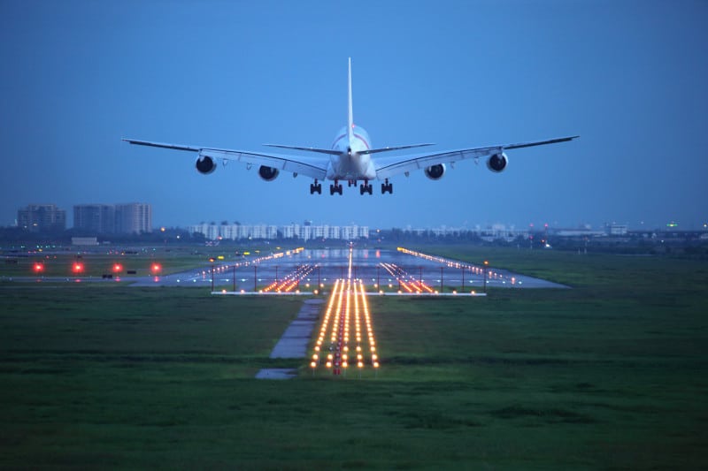 passenger plane fly up over take-off runway from airport passenger plane fly up over take-off runway from airport