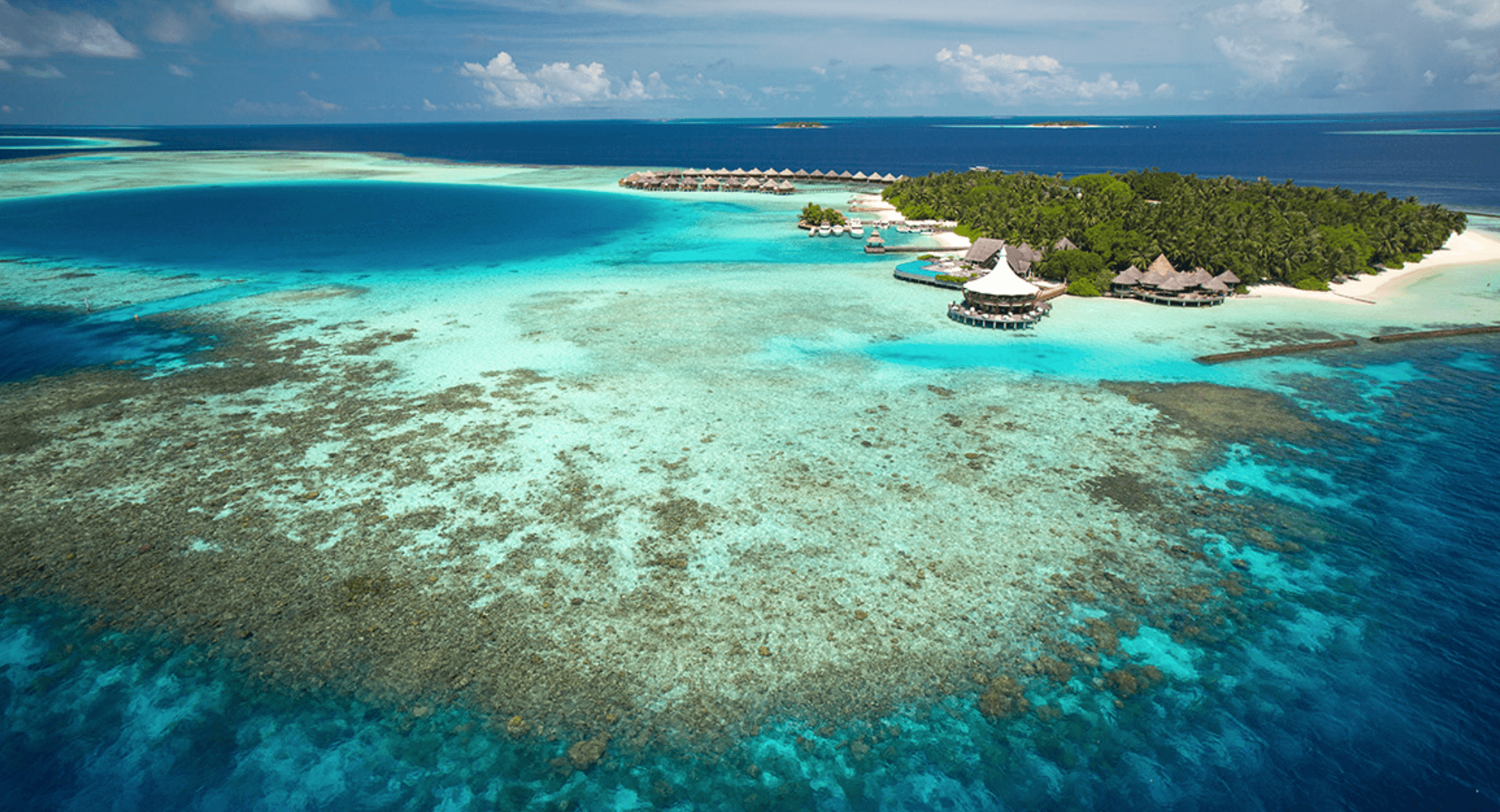 View of Baros resort and reef in The Maldives View of Baros resort and reef in The Maldives