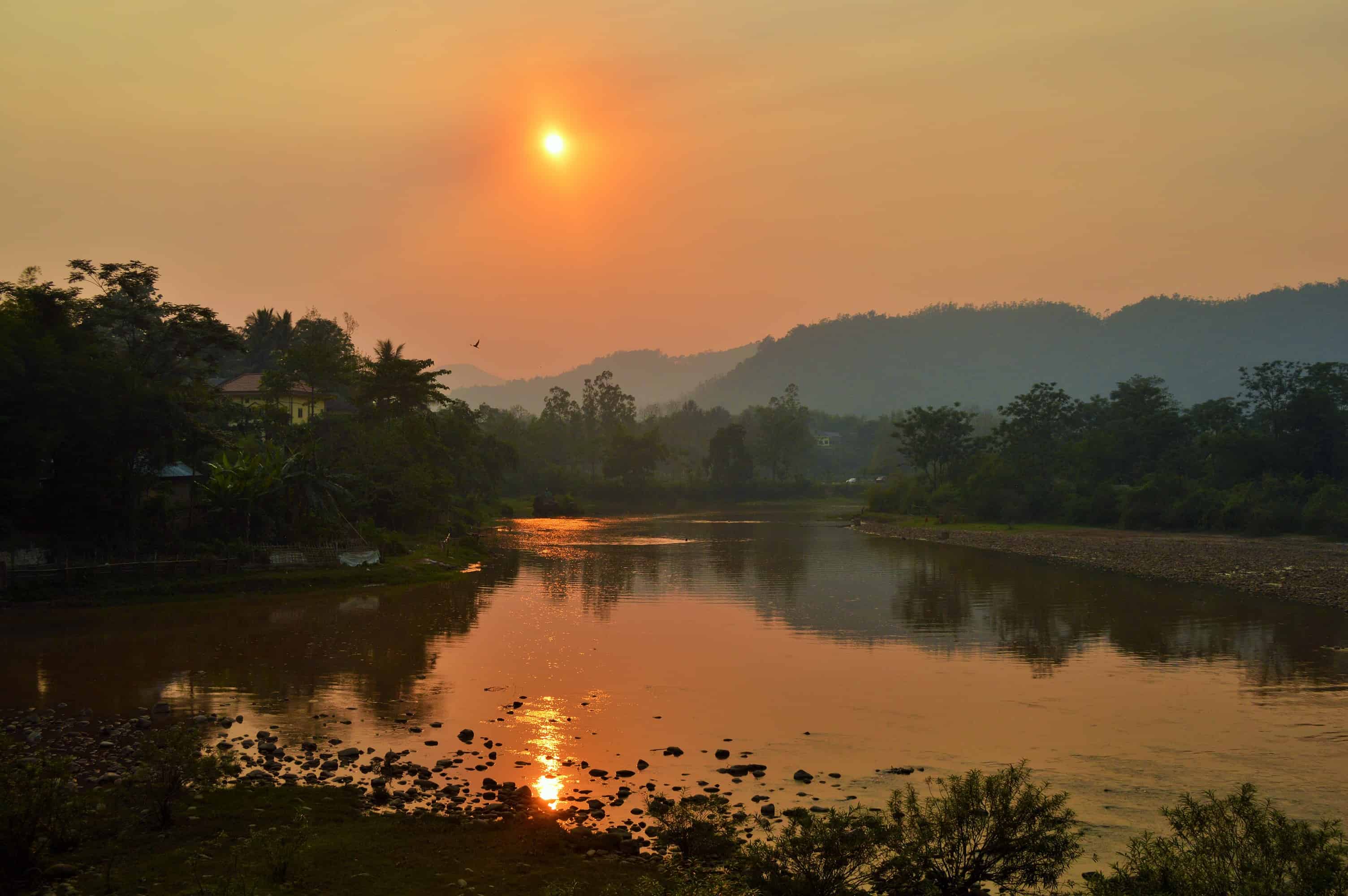 Sunset at Muang La in Laos Sunset at Muang La in northern Laos