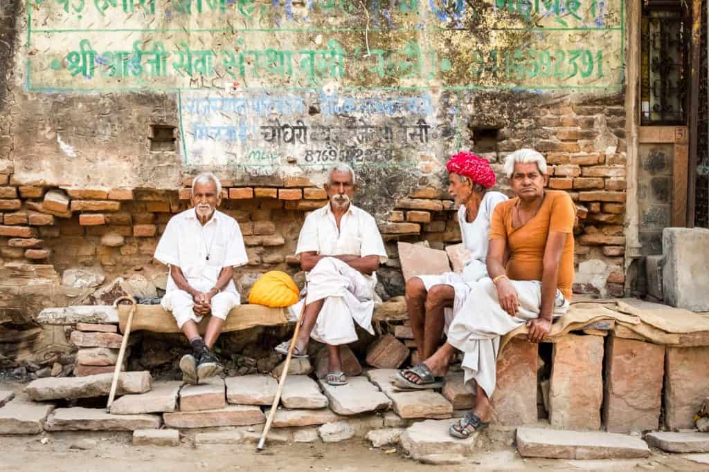 India-6 Four elderly gentlemen in a village in Rajasthan wearing traditional clothing