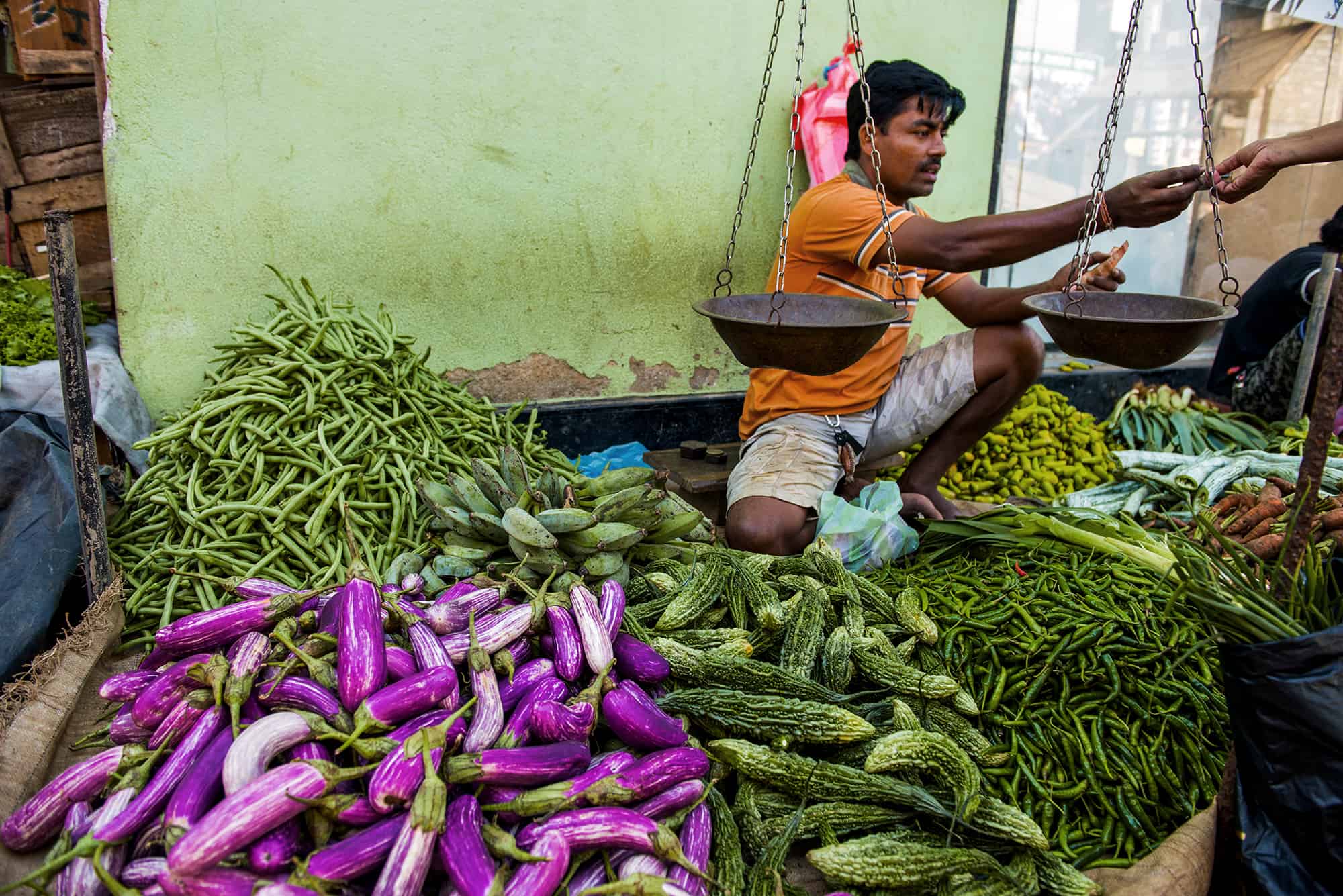 Vegetable Market Near Galle 2 Local trader in a vegetable market near Galle