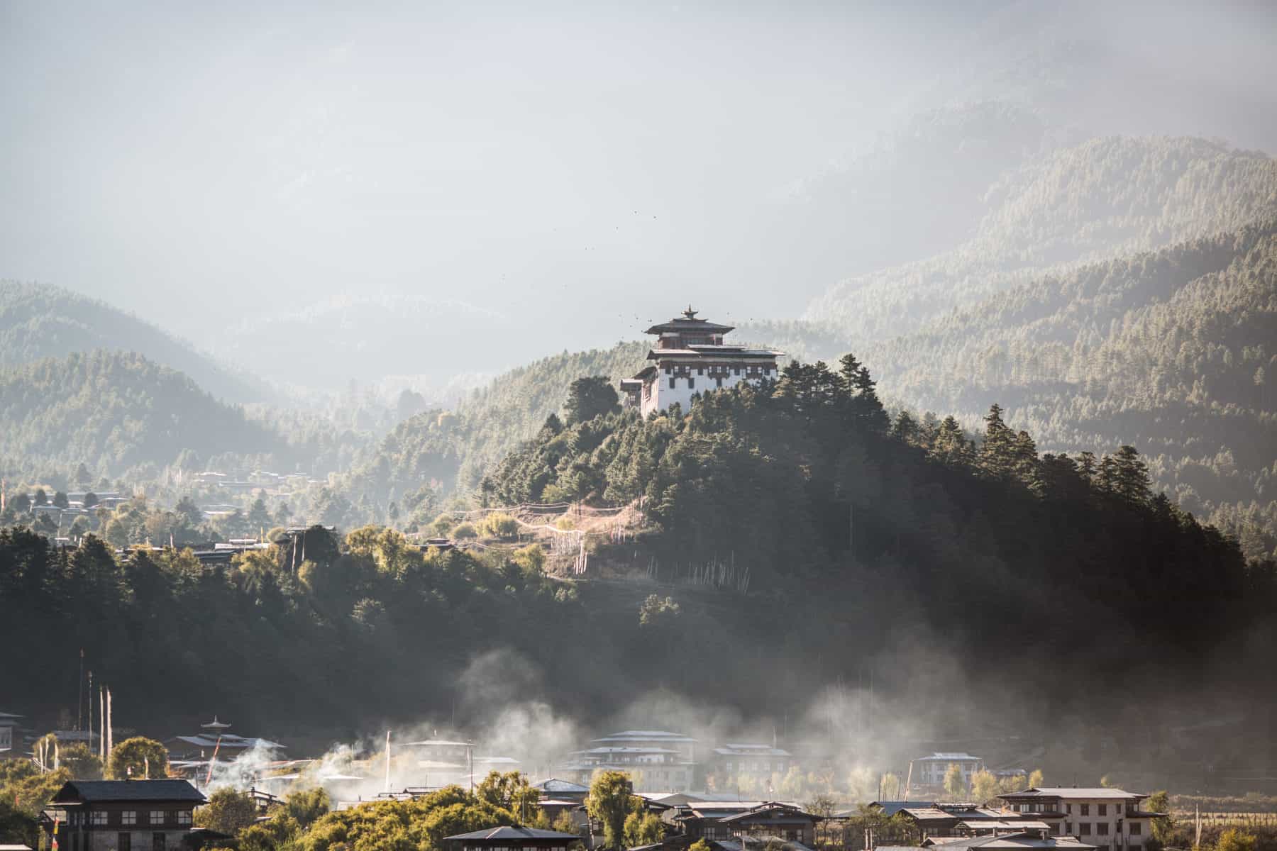 Bumthang Bhutan Bumthang Dzong at sunrise in Bhutan as the mist lifts