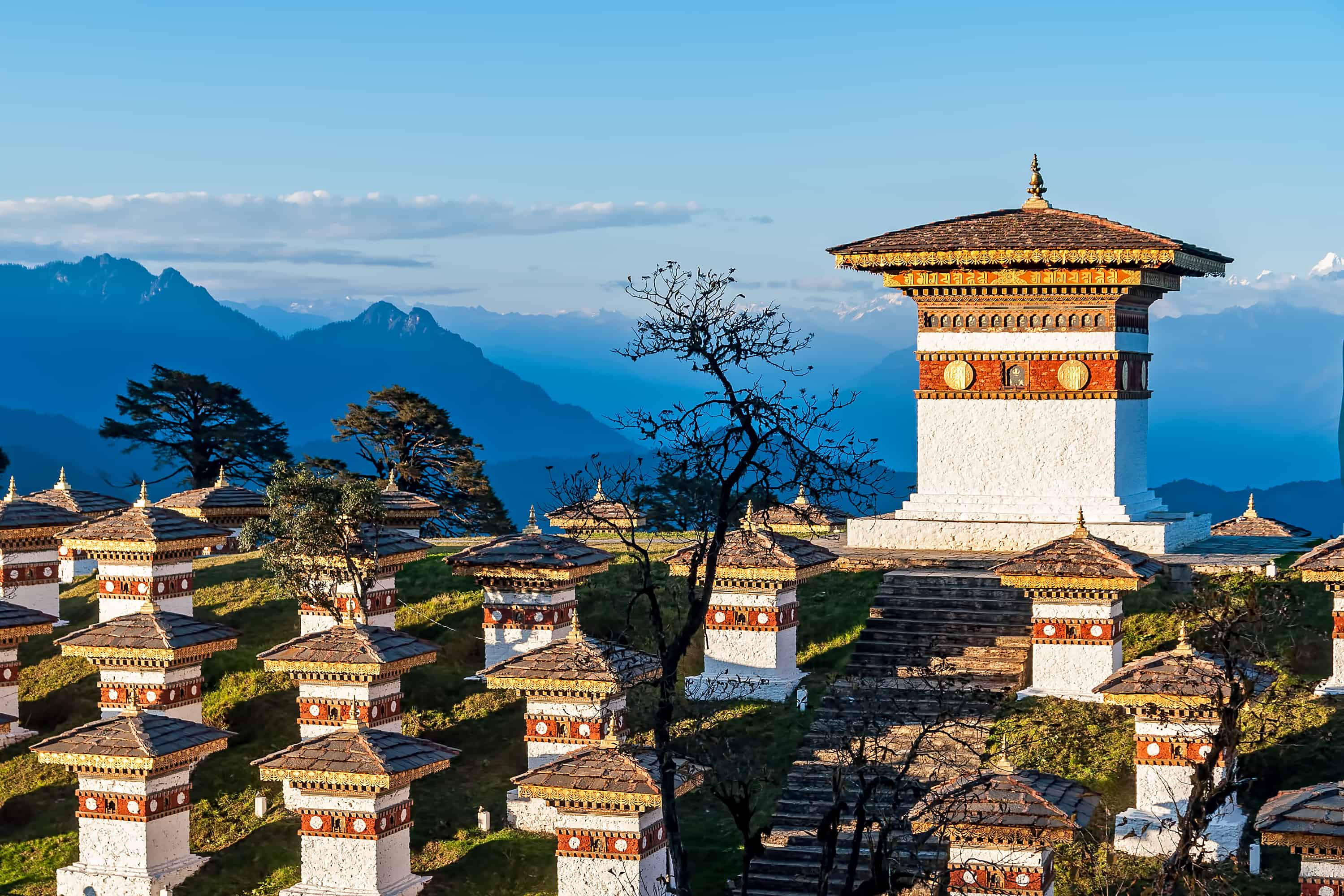 Sunset Dochula Pass Memorial Chortens in Bhutan Sunset Dochula Pass Memorial Chortens in Bhutan with mountains in the background