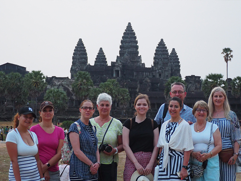 Cambodia Fam 8 Travellers in front of Ankor Wat in Cambodia