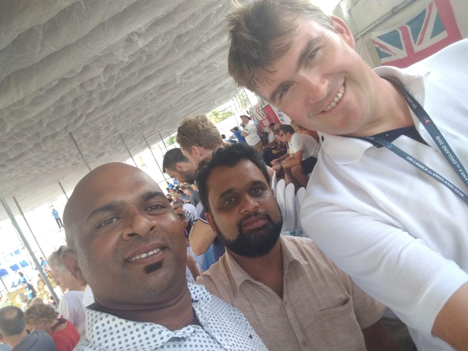 5befdfea-8d36-4b4e-a1a8-b7a069560fa7 Traveller and guides at an England v Sri Lanka cricket game in Galle