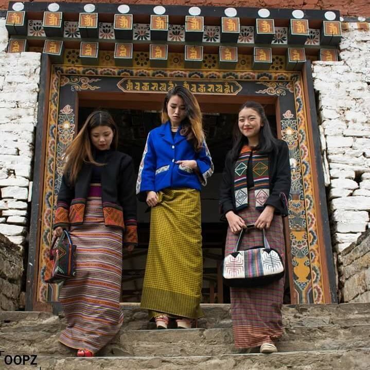 She Bhutan 2 Women wearing national dress in Bhutan