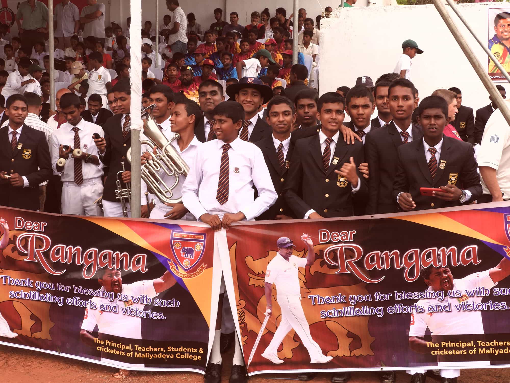 Sri Lankan children watching cricket in Galle Sri Lankan children watching cricket in Galle