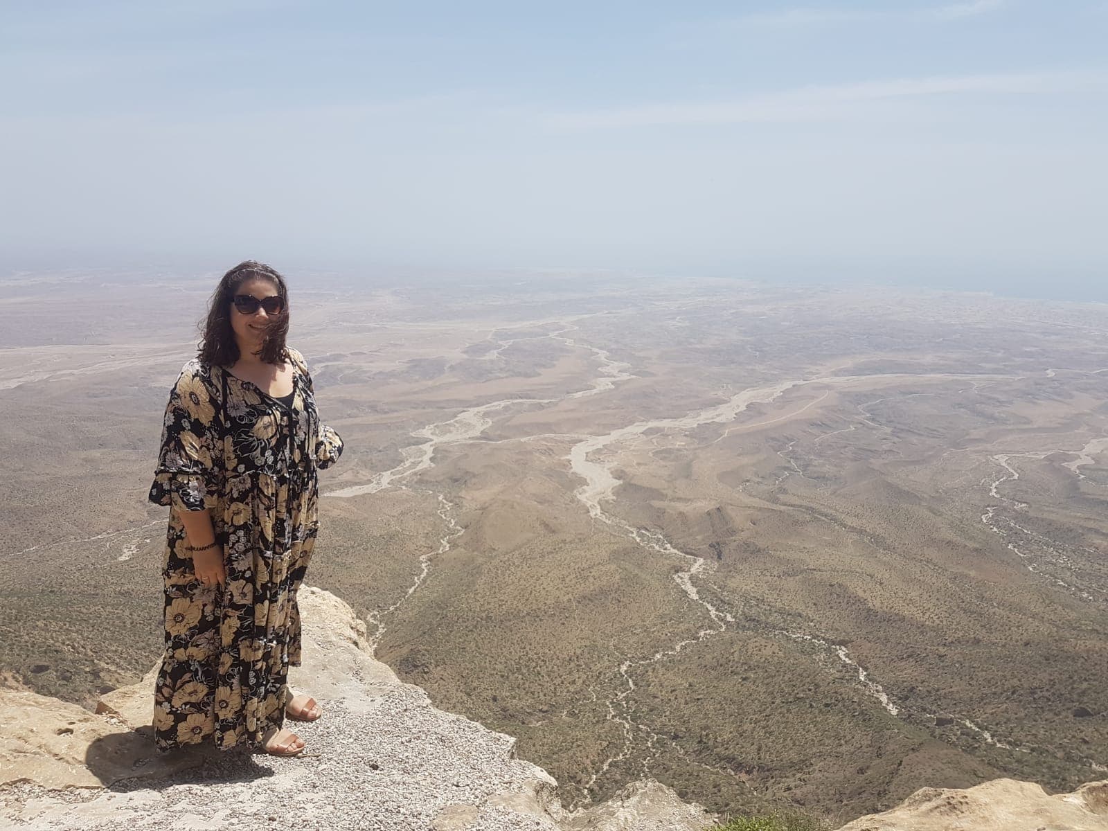 Becky family Christmas in Asia Traveller with a backdrop on the desert in Oman