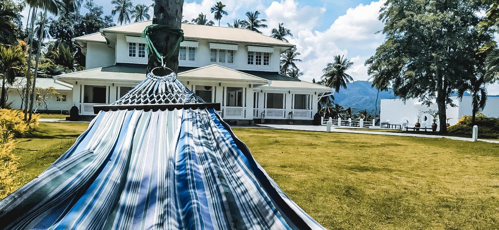 Flame Tree Hotel Kandy Hammock in the grounds of Flame Tree Hotel Kandy with the main house in the background