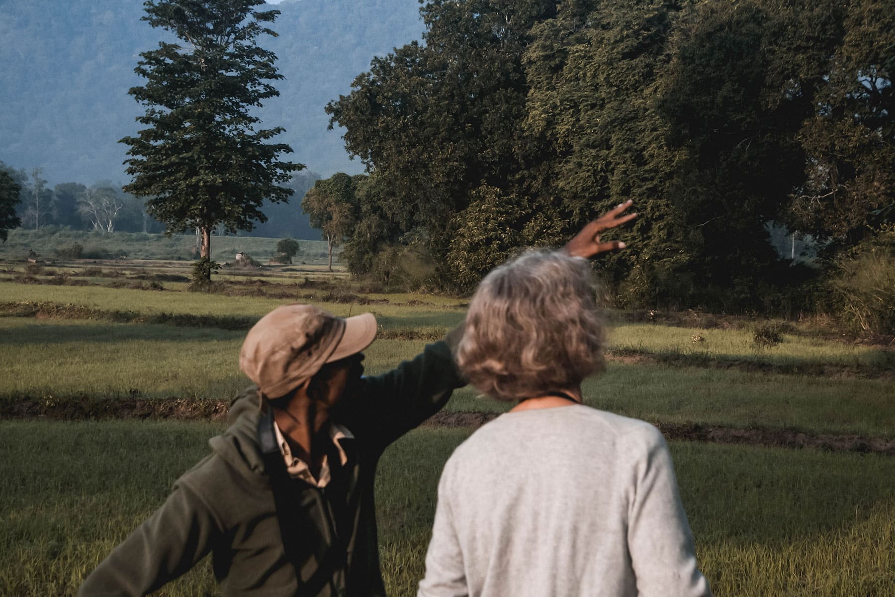 Gill-Coates-Resize9 Guide pointing out birds to a traveller in Sri Lanka