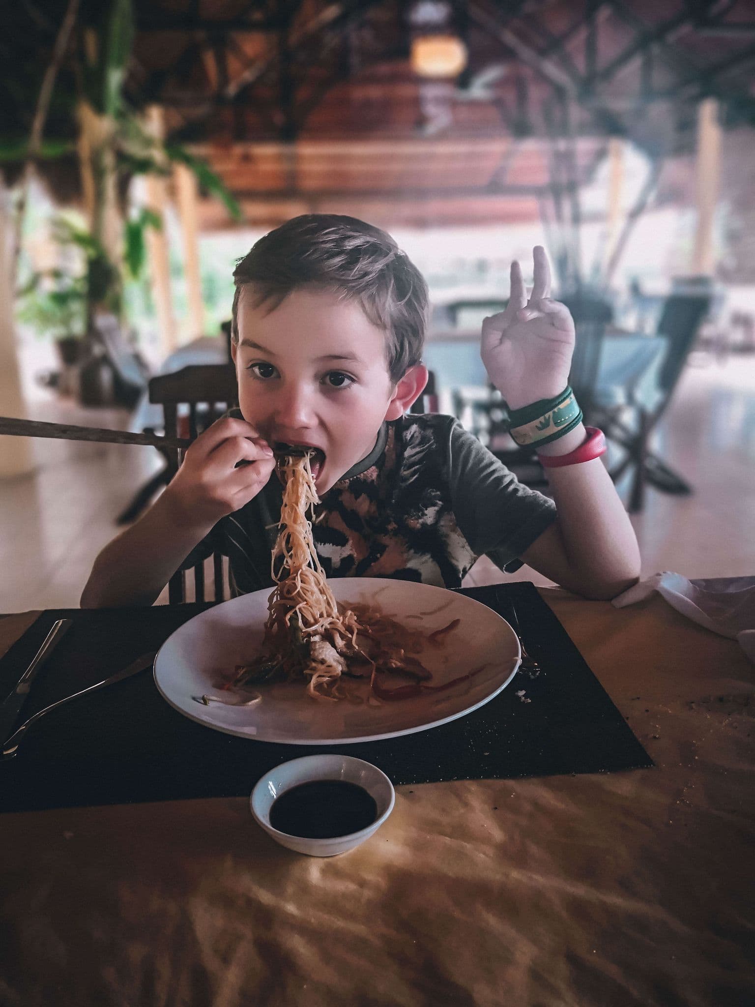 Kids Food Asia Child eating streetfood in Vietnam