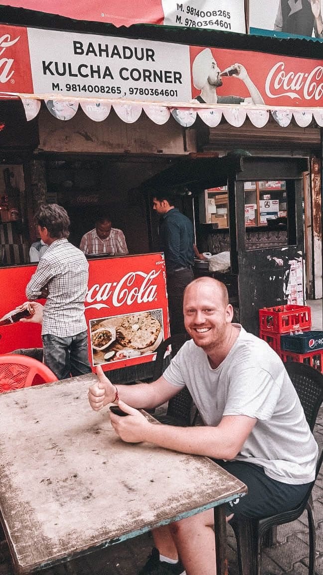 India Traveller Curious Traveller on a street food tour in Amritsar waiting for Kulcha