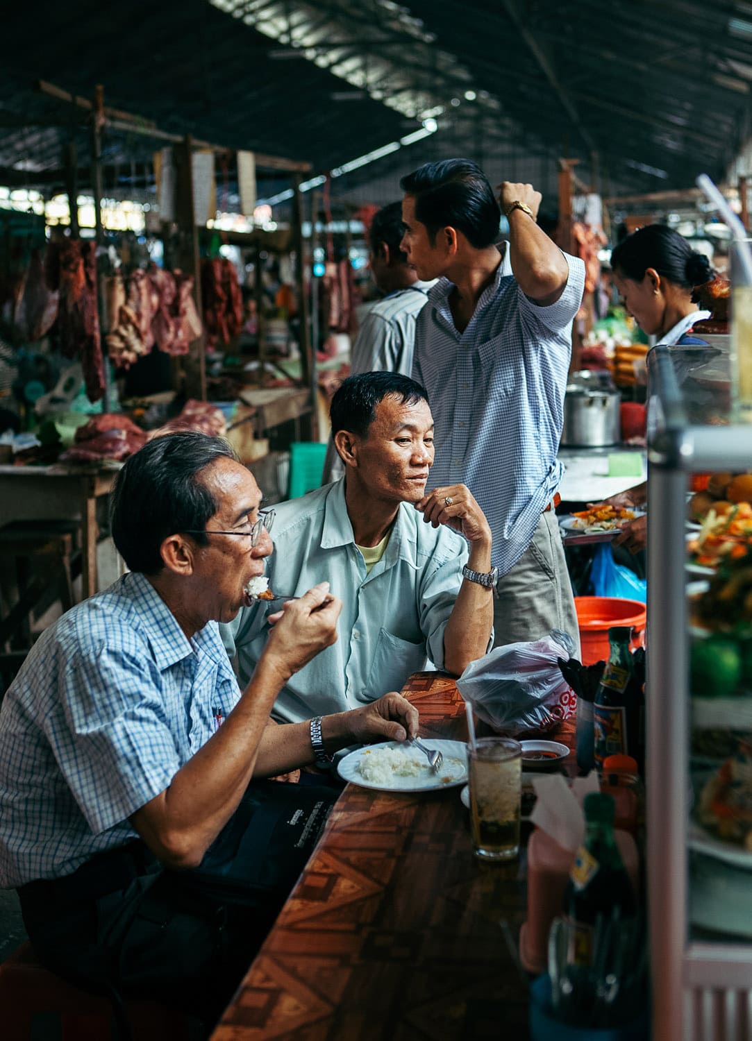 Phnom Penh market Locals eating in a Phnom Penh, market, Cambodia