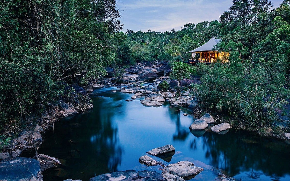 Shinta Mani Wild Cambodia A luxury tent at Shinta Mani Wild overlooking the river in the heart of the Cardamom Mountains