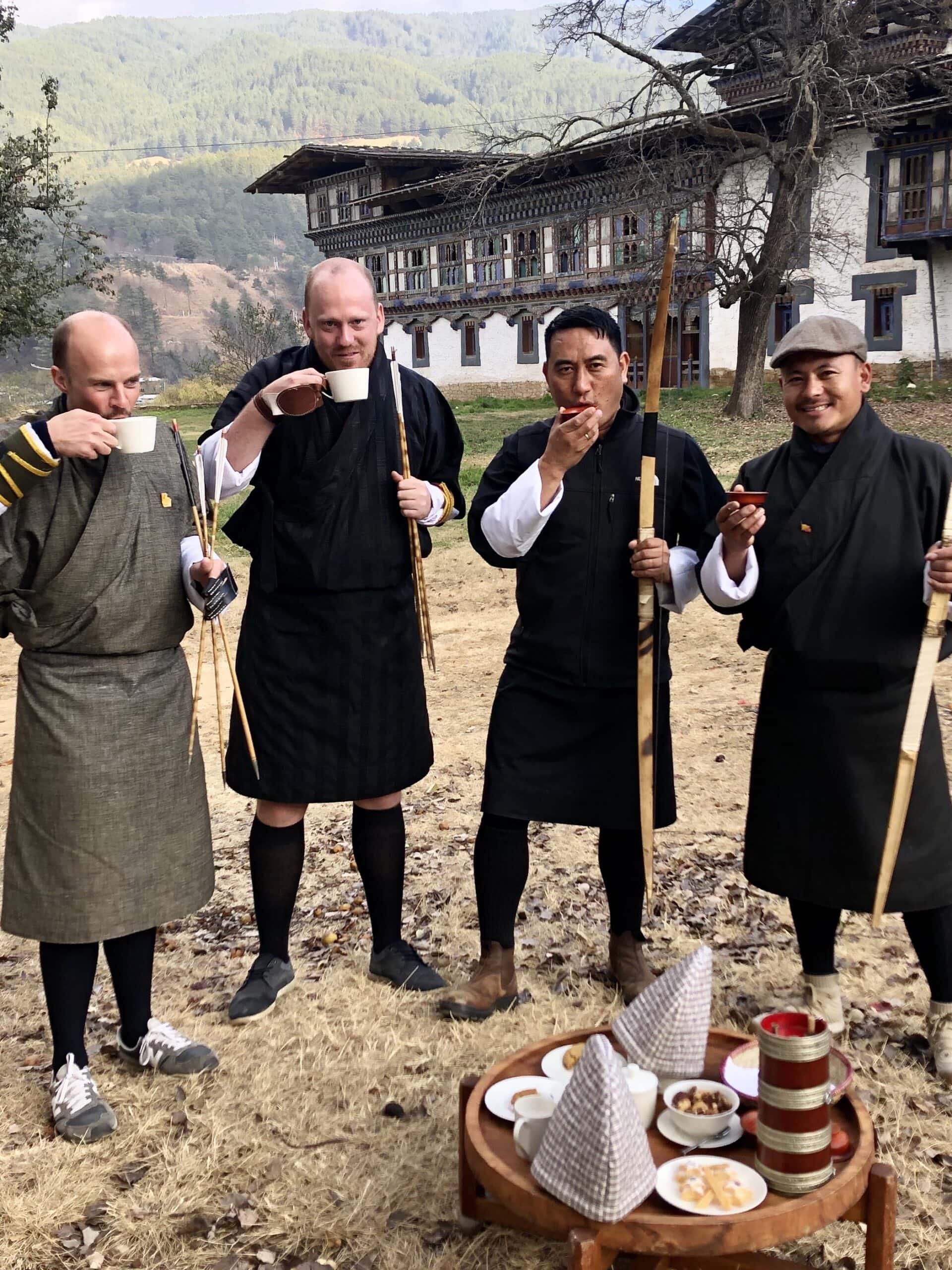 Playing Archery at Amankora Travellers and guides taking a break from archery at Aman Bumthang in Bhutan