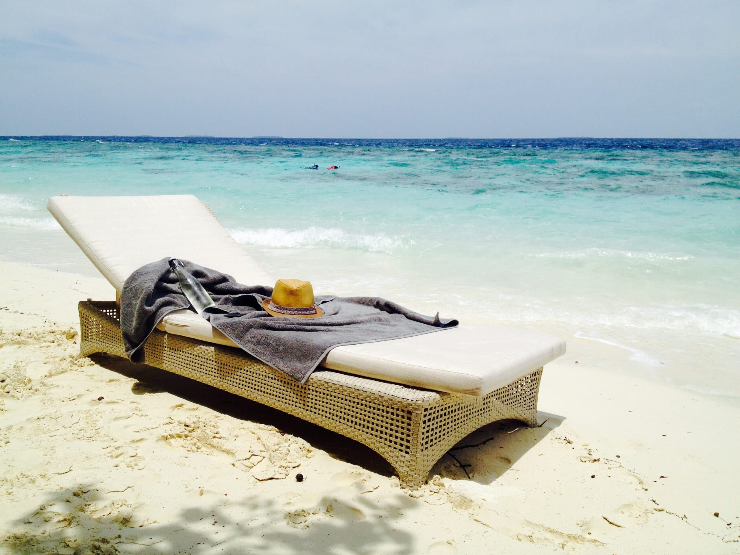 Sun lounger in the Maldives Typical beach set up in the Maldives