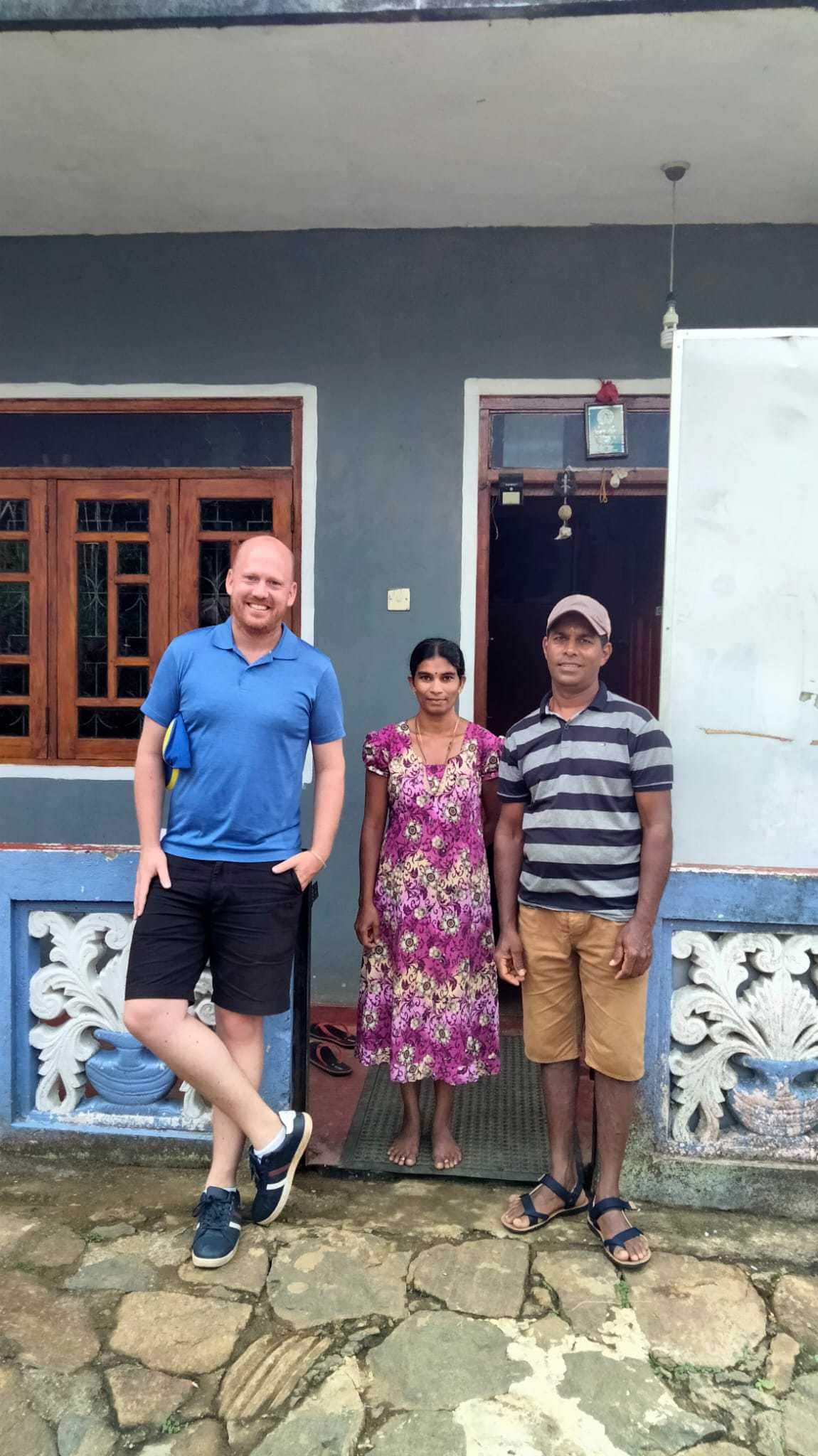 WhatsApp Image 2021-10-27 at 16.34.50 Tamil Husband and Wife with tourist outside their simple house in the tea plantations of Haputale