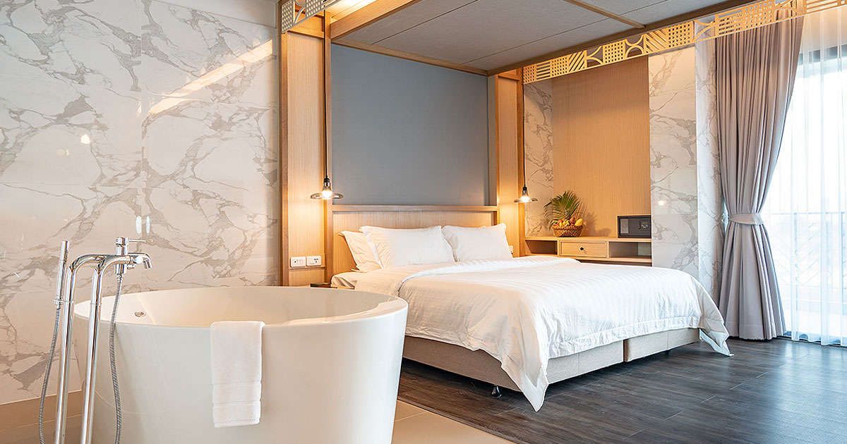 Bathroom in the middle of a bedroom