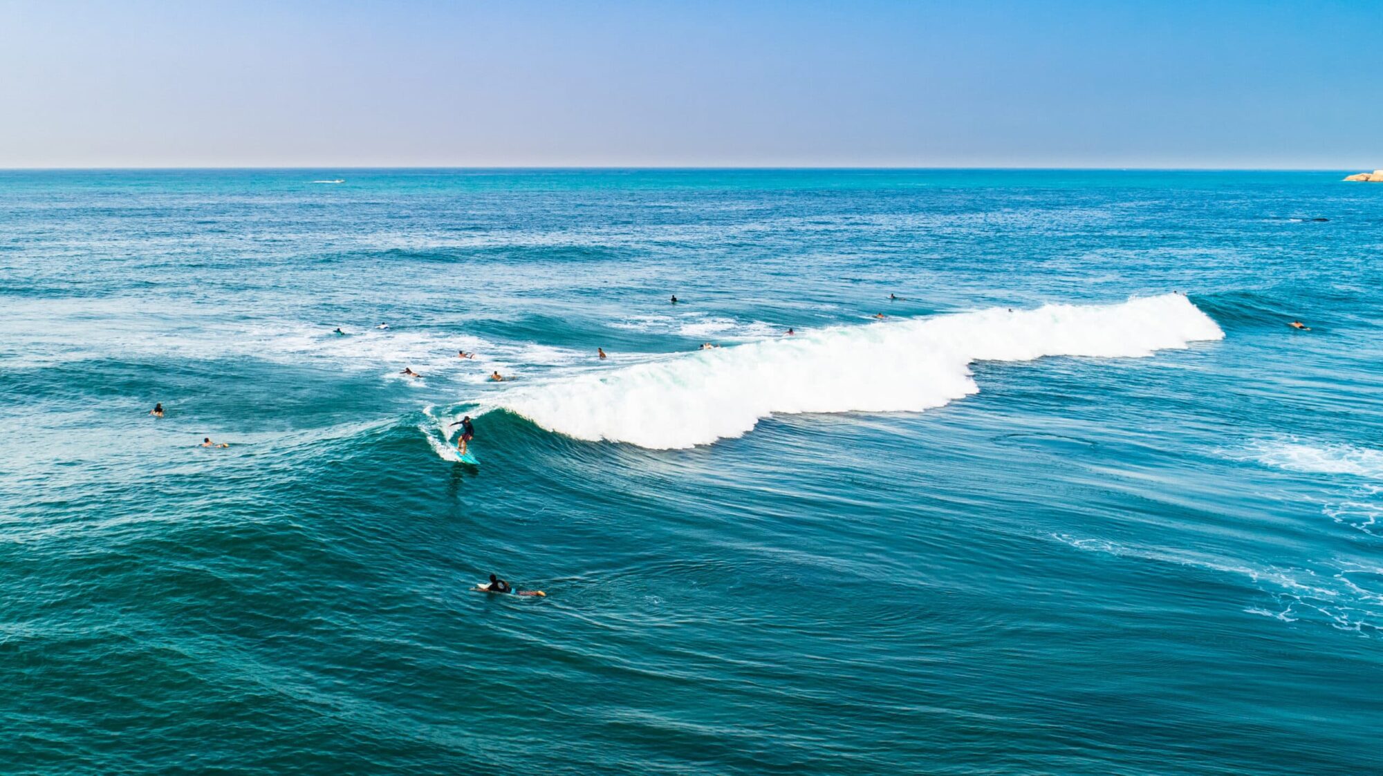 Aerial View Of Surfers Near Hikkaduwa Beach in Sri Lanka Aerial View Of Surfers Near Hikkaduwa Beach in Sri Lanka