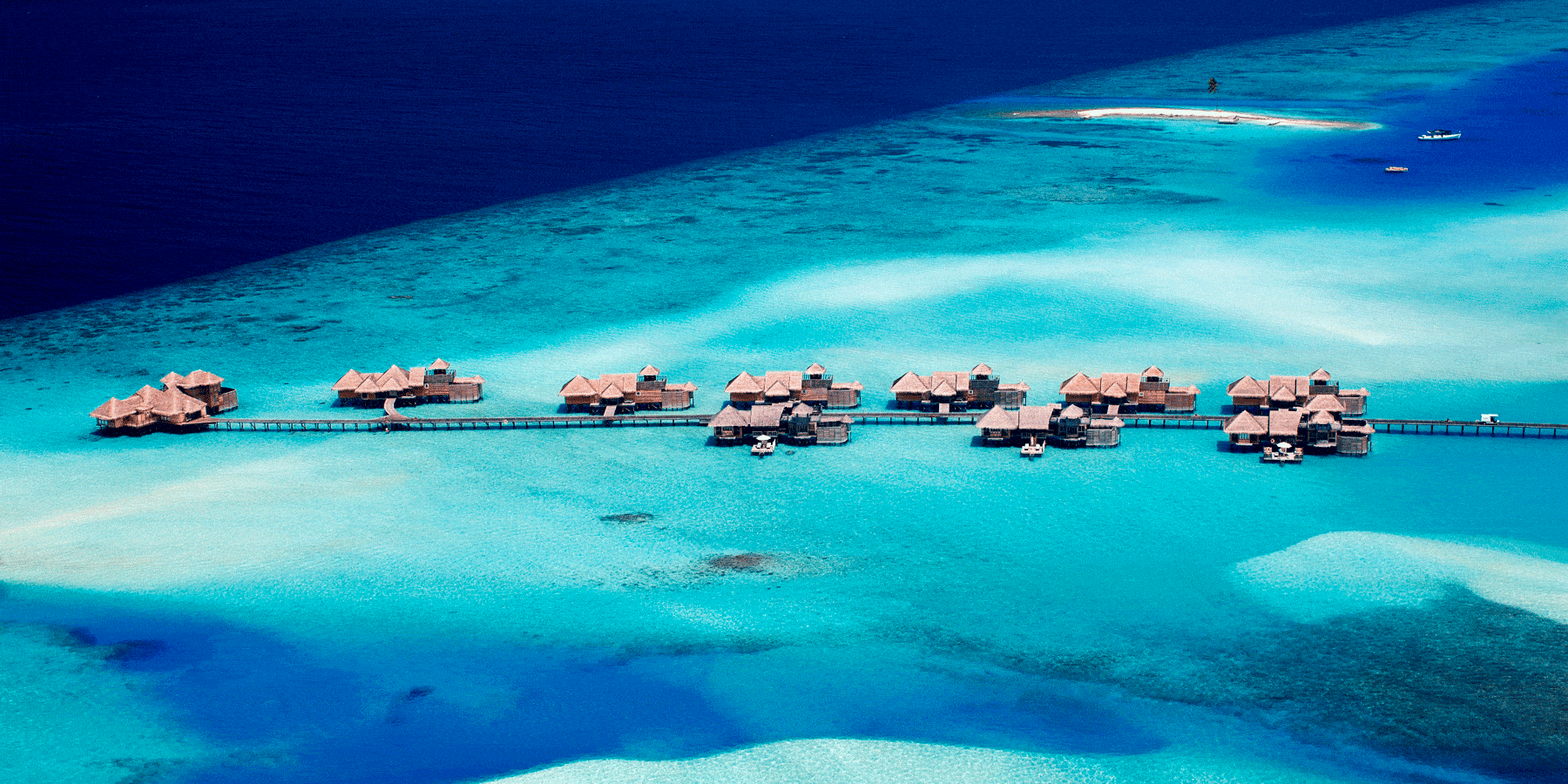 Ariel photo of Gililankanfushi in the Maldives with overwater villas Ariel photo of Gililankanfushi in the Maldives with overwater villas
