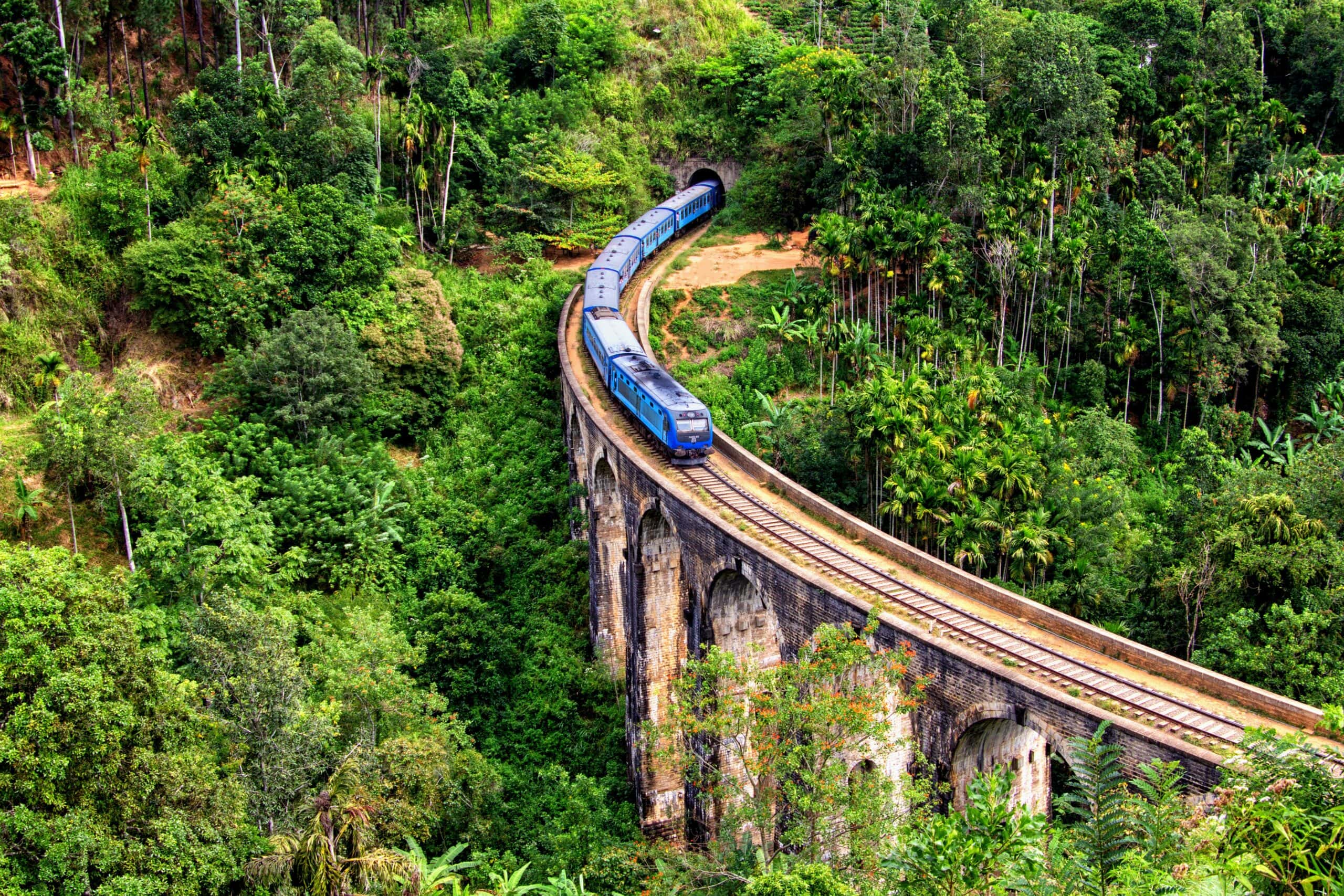 Train passing along the Nine Arch Bridge in Ella, Sri Lanka Train passing along the Nine Arch Bridge in Ella, Sri Lanka
