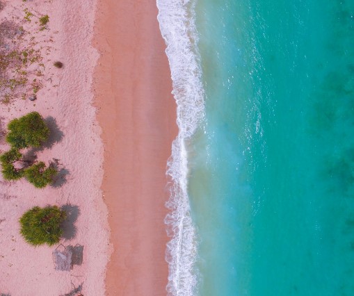 Aerial view of pink sand beach in Indonesia Aerial view of pink sand beach in Indonesia