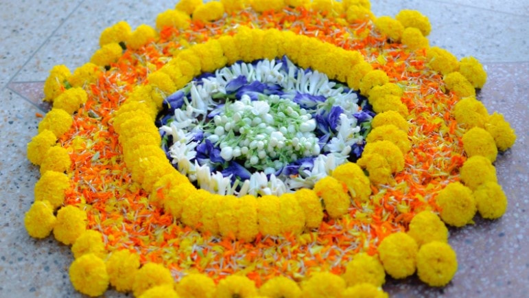 Bright and colourful pookalam (India flower arrangement) Bright and colourful pookalam (India flower arrangement)