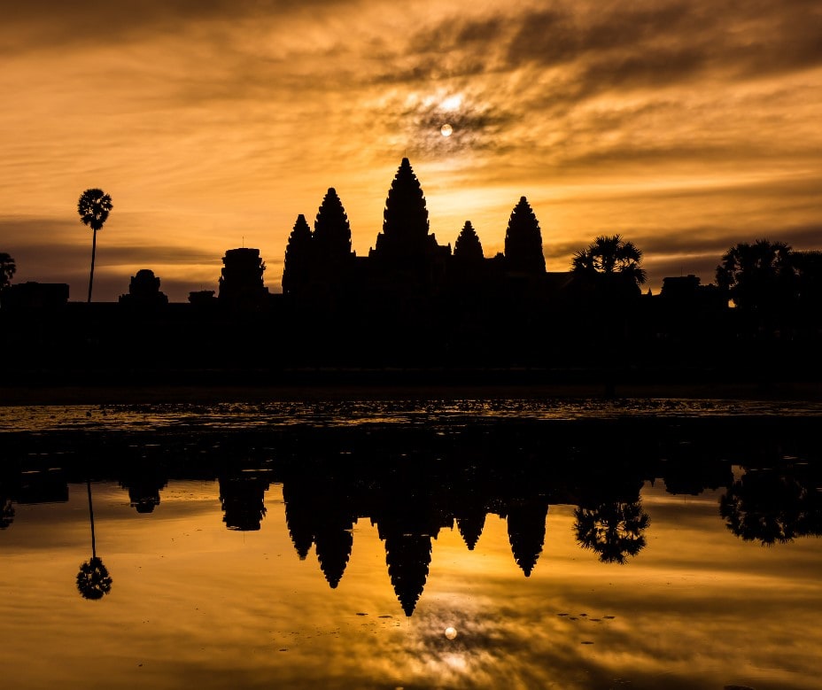 The silhouette of Angkor Wat at sunrise. The silhouette of Angkor Wat at sunrise.