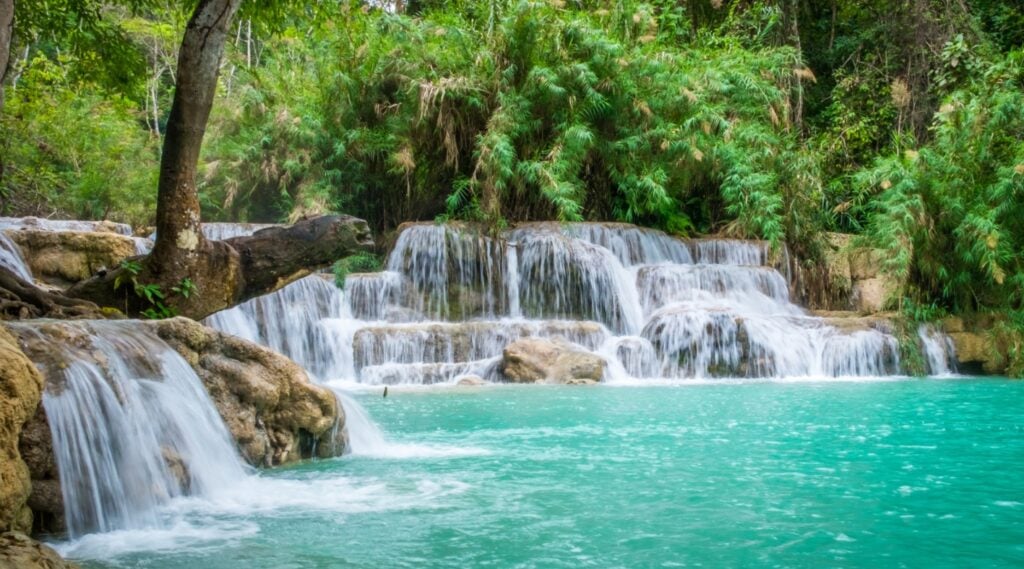 Picturesque tiered waterfalls at Kuang Si Falls in Laos Picturesque tiered waterfalls at Kuang Si Falls in Laos