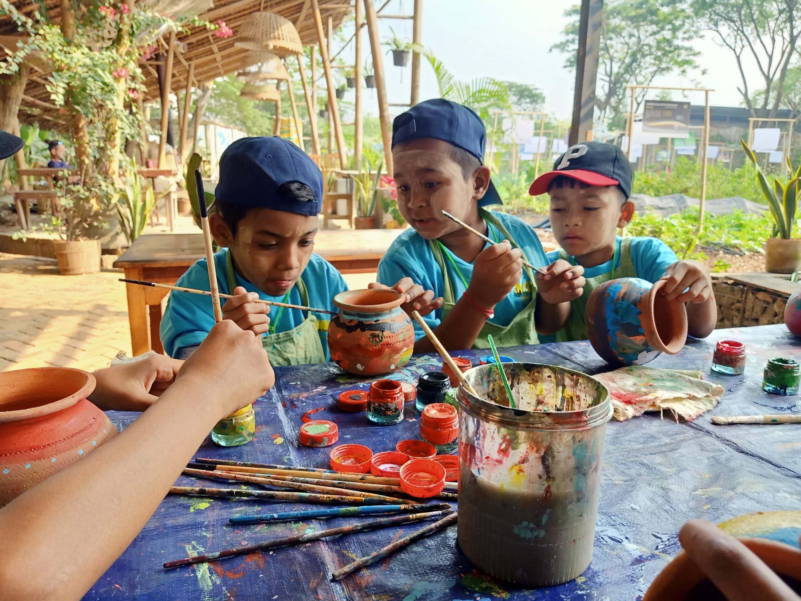 Myanmar trip (3) The children get creative painting plant pots to take home at Kokkoya Organic Farm, Yangon. March, 2023.